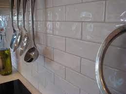 Maybe you would like to learn more about one of these? Retro White Subway Tile Wavy Irregular Like This One Shown Backsplash And Wa White Subway Tile Backsplash White Subway Tile Kitchen White Kitchen Backsplash