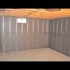 Using the power drill fitted with a drywall bit, set three or four drywall screws into the joists with the wall marks as your guide. 1