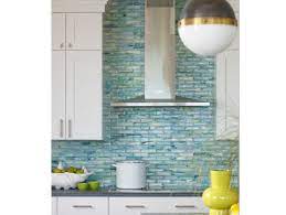 The wall behind the cook top has the same 10″ high backsplash and that leaves a large area of painted wall that is always oily & dirty looking. Where To Stop Tile Behind A Vent Hood Decorist