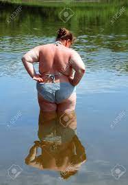 Overweight Woman Bath In River Stock Photo, Picture and Royalty Free Image.  Image 3358908.