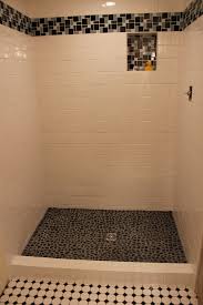 River rock tiles work on either floors or walls. Subway Shower With River Rock Floor Tile Art Center