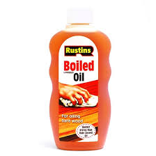 Mineral oil will work fine but will leave the wood looking dull. Boiled Linseed Oil Rustins