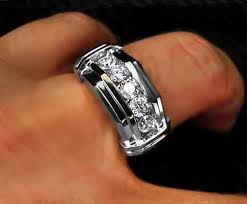 Wider rings tend to be more expensive (since they require a larger quantity of precious metal) the metals traditionally used for men's wedding rings are platinum, white gold, yellow gold, and rose gold. Men S Diamond Ring Men Diamond Ring Rings For Men Mens Wedding Rings