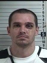 Inmate charged over pot-coated documents