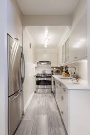 Making Way For A Nursery And More In This Duplex Apartment Renovation Galley Kitchen Design Kitchen Design Small Small Galley Kitchen Designs