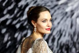 She is a sex symbol whose styles many girls like to copy. Angelina Jolie Style Fashion Photos Outfits British Vogue British Vogue