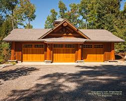A Log Post And Beam Garage Because Log Garages Given The Amount Of Wall Length Can Consume A Disproportionate Amo Garage Design Log Home Designs Timber House
