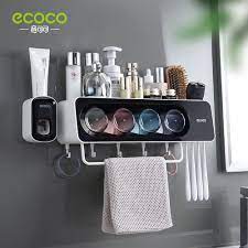 Amazon.com: ECOCO Multifunctional Wall-Mounted Toothbrush Holder, Automatic  Toothpaste Dispenser Space Saving Toothbrush Organizer with Dustproof  Cover, Cups and Drawers Cosmetic Organizer : Home & Kitchen