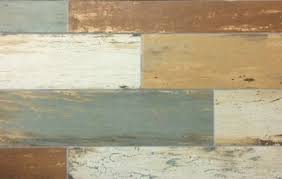 These irregular wooden tiles are so intricate in color and texture. Marvel Wood Look Porcelain Wall And Floor Tile 6 X 24 In The Tile Shop Wood Mosaic Tile Wood Mosaic