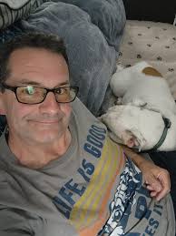 That kid holding his dog looks like you