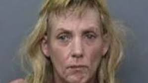 Woman arrested for stealing Mustang...