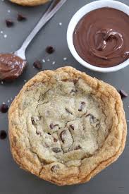 Giant Nutella Stuffed Chocolate Chip Cookies From Www Twopeasandtheirpod Com Cookie Recipe Nutella Recipes Chip Cookies Chocolate Chip Cookies