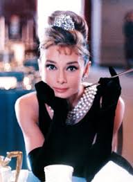 Her sides have been cut short and jagged and her top has been angle layered to create a piecey effect. How To Audrey Hepburn S Timeless Updo Tutorial Period Hairstyles