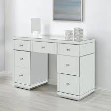 You can pick a table with plenty of drawers. Hollywood Mirrored 7 Drawer Dressing Table