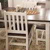 If you sit too high, your thighs might hit the underside of the tabletop, which can turn long dinners into a torment. 1