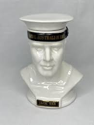 Sold at Auction: Bullocks Tawny Port- ceramic Royal Australian Navy Jack Tar  decanter. 21.5cm H, 17cm W, 14cm D.