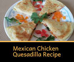 Cut chicken quesadilla in half and serve with sour cream and guacamole. Authentic Mexican Chicken Quesadilla Recipe Delishably