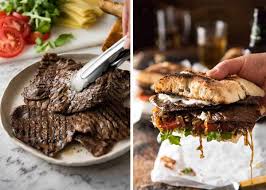 This steak bomb sandwich recipe combines tender shaved steak, melted provolone cheese, caramelized onions, mushrooms sautéed in bourbon, and our roasted garlic aioli into one amazingly good steak bomb sandwich. Steak Sandwich Recipetin Eats