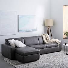 High quality supple and smooth grey leather. Enzo Leather Reclining 3 Seater Sectional With Storage Chaise