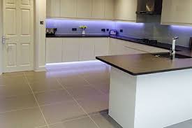 why do tiles have a bevelled edge