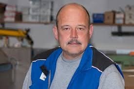 Über uns: Team, unser Neubau und Fuhrpark