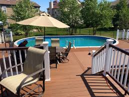 Composite Pool Deck With Timbertech Brown Oak Backyard Pool Landscaping Backyard Pool Swimming Pool Decks