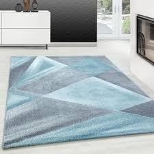 Und das nicht nur mit viel sonne und angenehmen temperaturen, auch die neuen frühjahrskollektionen zaubern uns ein lächeln aufs gesicht und bringen die kollegen regelrecht zum tanzen! Modern Designer Teppich Geometrische Muster Kurzflor Grau Blau Weiss Meliert Teppium Online Teppich Market