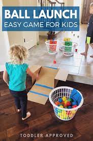 Easy Ball Launch Activity For Kids Toddler Approved Physical Activities For Toddlers Fun Indoor Activities Toddler Activities