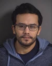 Iowa City driver collided into power pole, faces OWI charge