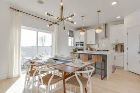 The dining room is quite similar to the living room on many accounts. Mid Century Modern Dining Table With White Wishbone Chairs Transitional Dining Room