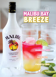 Malibu (coconut rum), pineapple juice, and cranberry juice. How To Make A Malibu Bay Breeze Drink Two Ways