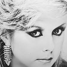 I love Kirsty MacColl and it's a teen-ageing/adulting multi-levelled love.  With her, I sense a frisky intellectual pop-anarchist, blink-glimpsing a  wily/wicked wink at a widely befuddling world she was always ten steps