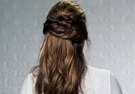 The look that says, yes, i wanted my hair in a ponytail, but no, i did not want to look like a hot mess the style that can be glammed up with accessories and pins or downplayed with elastics and natural texture. Half Up Half Down Hairstyle How To Tutorial Biolage