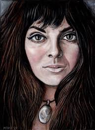 Last November I posted a picture of Caroline my dancing bones plant.  Caroline was just beginning to flower then. Some people requested that I  share pictures of Caroline when she flowered. So,