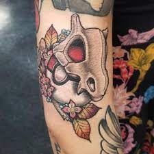 Fresh cubone skull from Kymbo at Embody Art in Tifton GA | Pokemon tattoo,  Cool tattoos, Skull tattoos