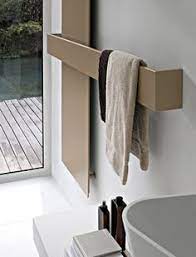 Wall shelves can be used for storing small items, organized in glass jars or plastic containers. 26 Bathroom Towel Heaters Ideas Towel Heater Bathroom Heater Bathroom Towels