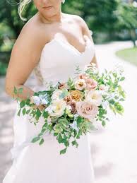 The best blue wedding flowers and 16 gorgeous blue bouquets sola flower bouquet dusty blue s. Garden Inspired Wedding Evergreen Flower Co