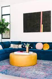 King size ottoman storage bed, yolk yellow Living Room With Blue Velvet Sectional And Yellow Leather Ottoman With Modern Art And Rug Hgtv