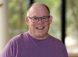 Father Long engaged lay staff in ministry