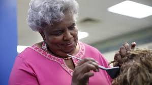 Black hair with pink highlights suits a loud and fun personality. Suburban Salon S First Black Stylist Celebrates 50 Years