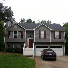Dark gray house with maroon shutters. Pin By Tara Smith On Home Exterior Exterior House Colors Outside House Paint Brown House Exterior
