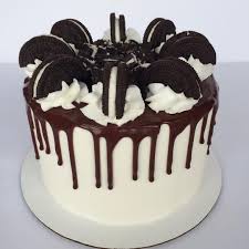 Oreo Drip Cake Chocolate Cake Filled With Vanilla Buttercream And Topped With Chocolate Ganache And Of Cour Drip Cakes Drip Cake Recipes Easy Cake Decorating