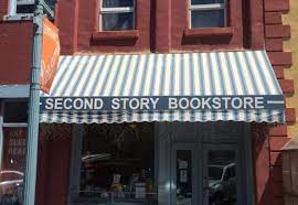 The dance hall was surrounded by numerous small rooms which explains the store's history as a hotel and a brothel. 2nd Story Books