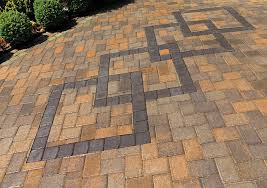 Pavers come in various combinations of colors, styles, sizes, thicknesses, patterns, and textures. Multi Colored Pavers In A Random Pattern Accented With Four Interlocking Diamonds Custom Pavers Outdoorliving Paver Designs Paving Design Diy Patio Pavers