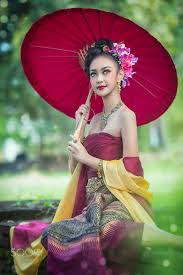 Thai Woman Dressing Traditional Costume Holding Red Umbrella By Pitakchatr Thepracha On 500px Traditional Dresses Thai Traditional Dress Thai Wedding Dress