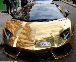 On the silver guilloche dial are black roman numerals with a date aperture at 3 o'clock position. Gold Lamborghini Worth 4m Pictured In Paris Could Be World S Most Expensive Car Daily Mail Online