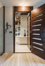 We cover architectural innovations, cool homes, ideas for specific rooms, new design trends, products and occasionally decor tips. à¤…à¤¦ à¤µ à¤¤à¤® Pavan Infratech Door Design Modern Modern Garage Doors Apartment Entrance