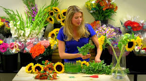 We were told in no uncertain terms that our branding was pretty much the key to whole foods taking a. Sunflower Centerpiece Idea From Whole Foods Flower Arranging Tutorial Sunflower Centerpieces Flower Arrangements