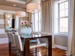 Black & white are a little bold me for but this would be incredible in gray & white for a little boys room or office. 15 Dazzling Dining Room Designs With Striped Walls