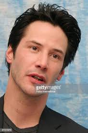 Actor Keanu Reeves speaks at a press junket for the movie "The...